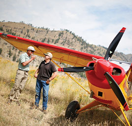 Photo of two people standing in front of plane. Link to Gifts of Cash, Checks, and Credit Cards. Photo of two people standing in front of plane. Link to Gifts of Cash, Checks, and Credit Cards.