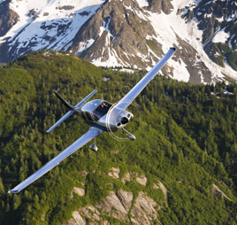 Plane flying over Alaska mountains. Links to Gifts That Pay You Income Plane flying over Alaska mountains. Links to Gifts That Pay You Income